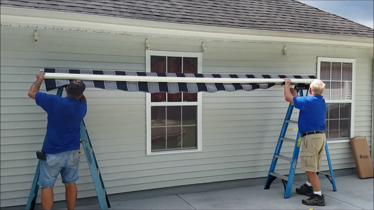 Awning installation team in action